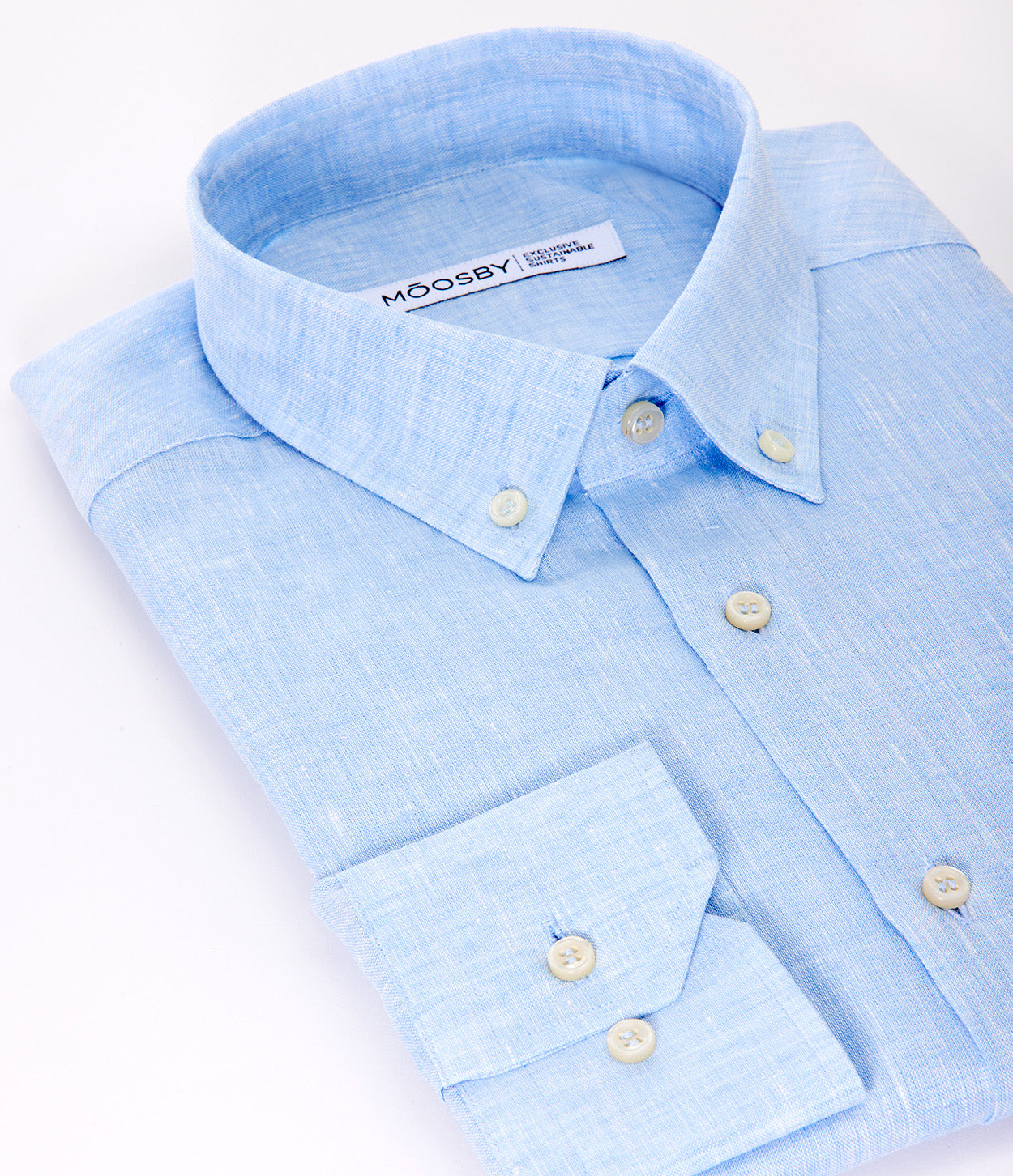 fotografía semi cenital camisa azul cielo