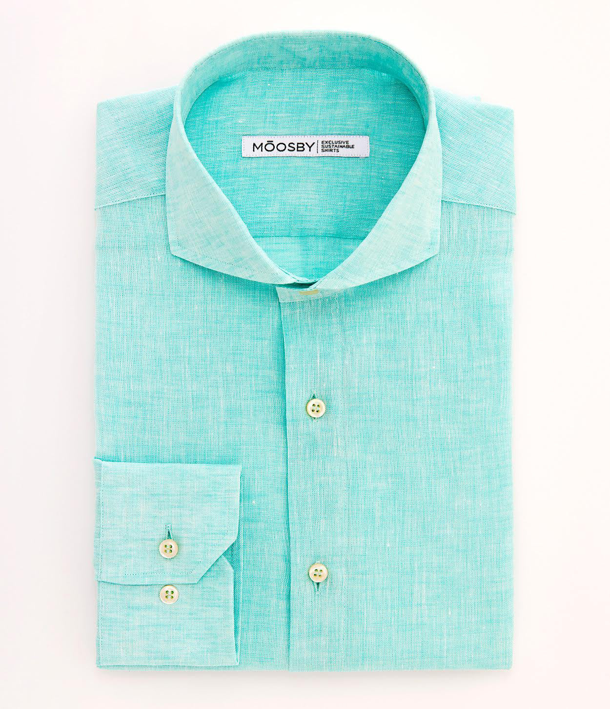 imagen cenital camisa verde plegada