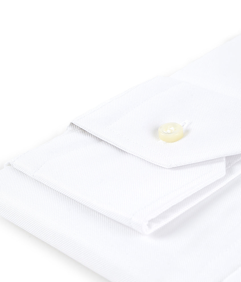 camisa blanca plegada foto detalle puño